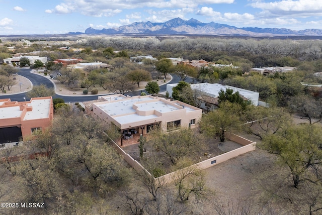 drone / aerial view featuring a mountain view