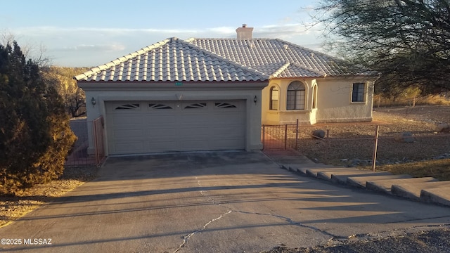 view of front of home with a garage