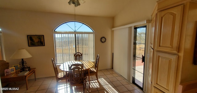 dining area with light tile patterned floors