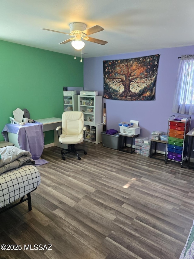 office featuring hardwood / wood-style flooring and ceiling fan