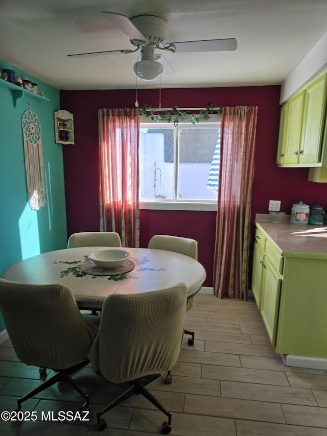 dining room with ceiling fan