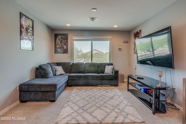 living room with light colored carpet