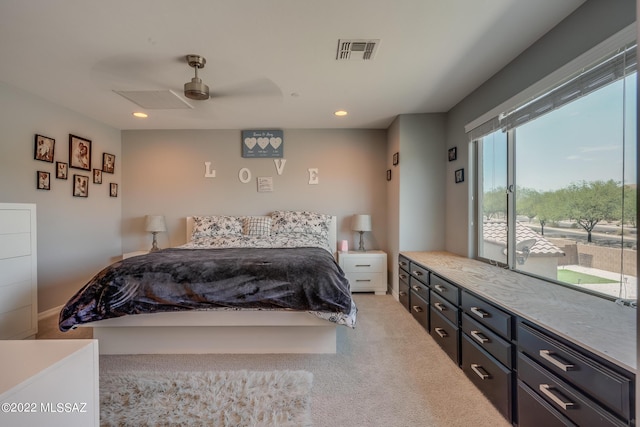 bedroom with ceiling fan, access to exterior, and light carpet