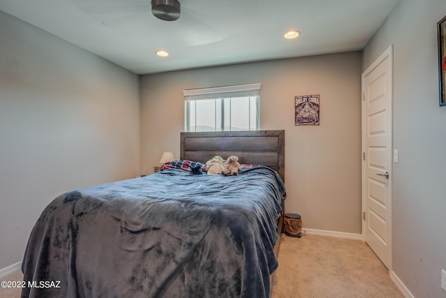 bedroom with light carpet