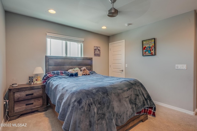 bedroom with light colored carpet and ceiling fan