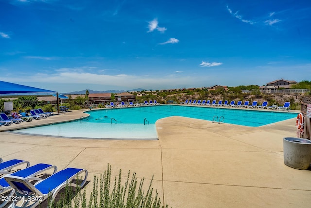 view of pool featuring a patio area