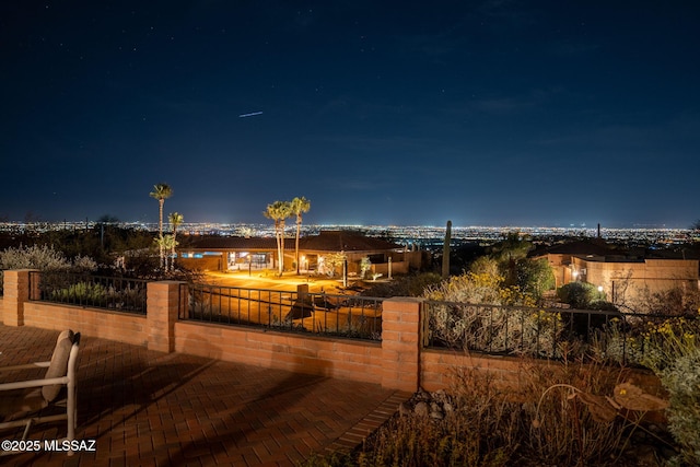 view of home's community featuring a patio area