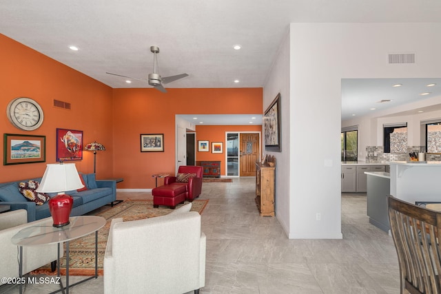 living room featuring ceiling fan