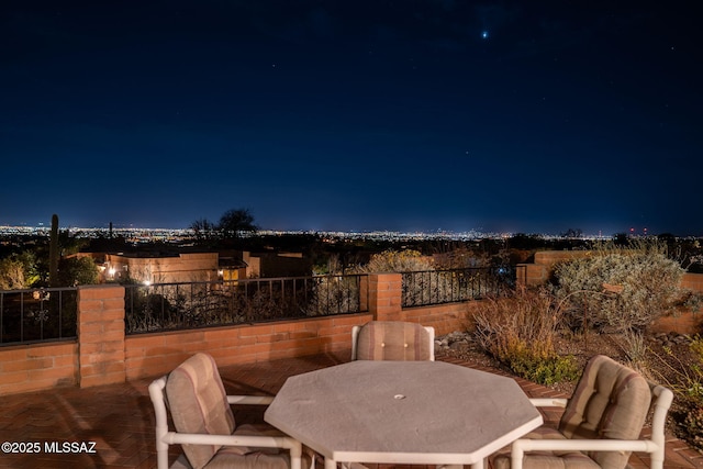 view of patio at twilight