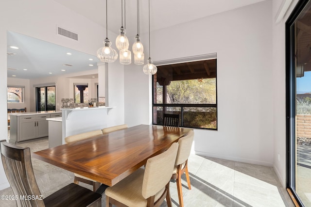 dining area featuring a wealth of natural light