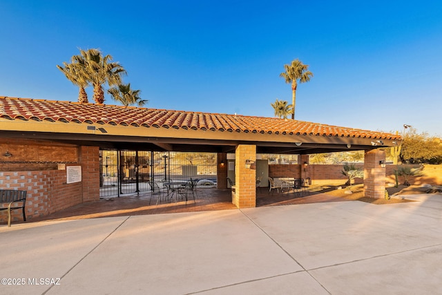 surrounding community featuring a patio