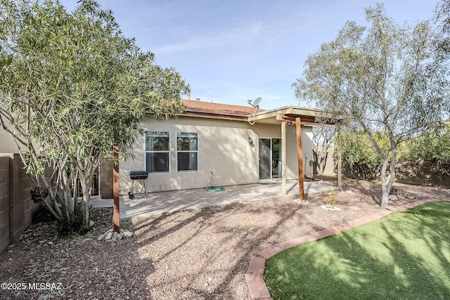 back of house featuring a patio