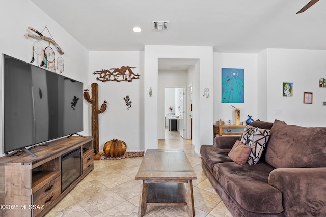 living area featuring visible vents