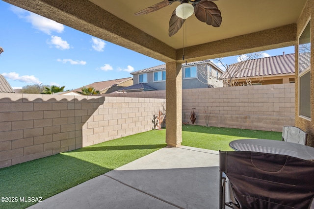 view of patio / terrace featuring a fenced backyard and ceiling fan