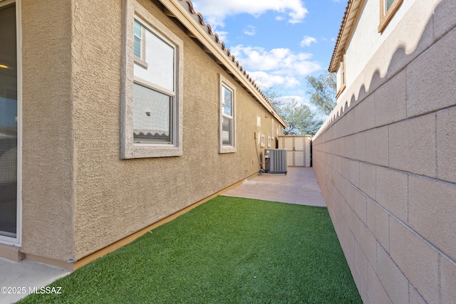 view of yard featuring a patio and fence