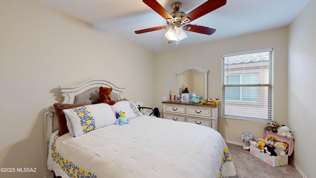 carpeted bedroom with ceiling fan