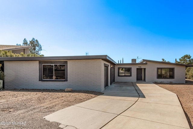 ranch-style home with a garage