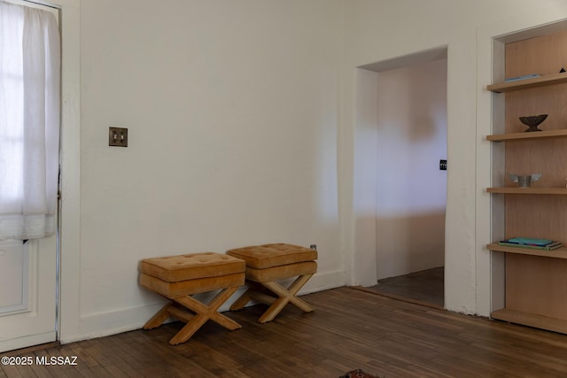 dining room with dark wood-type flooring