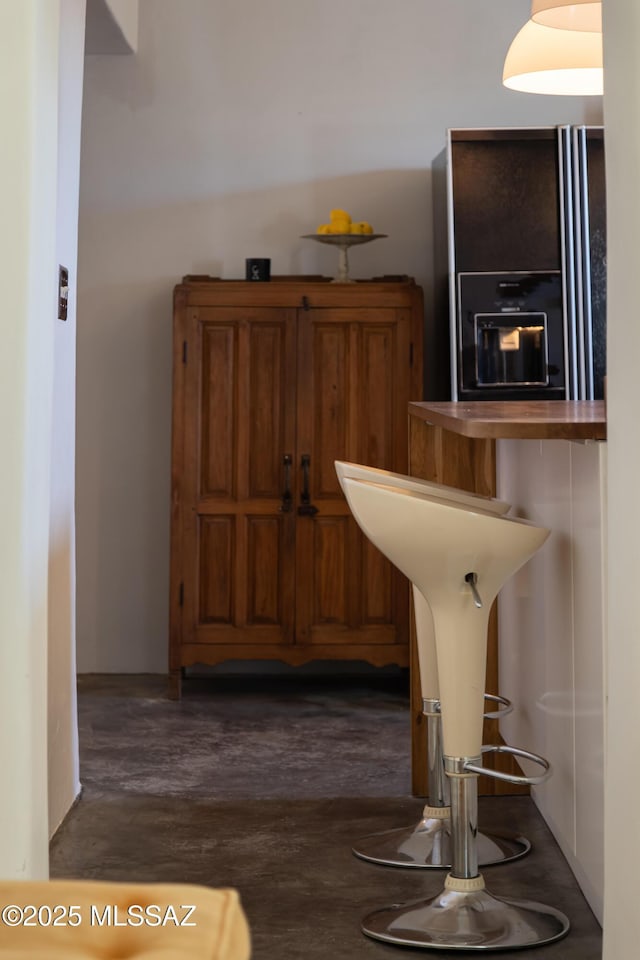 kitchen with dark hardwood / wood-style flooring