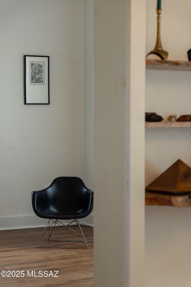 living area featuring hardwood / wood-style flooring