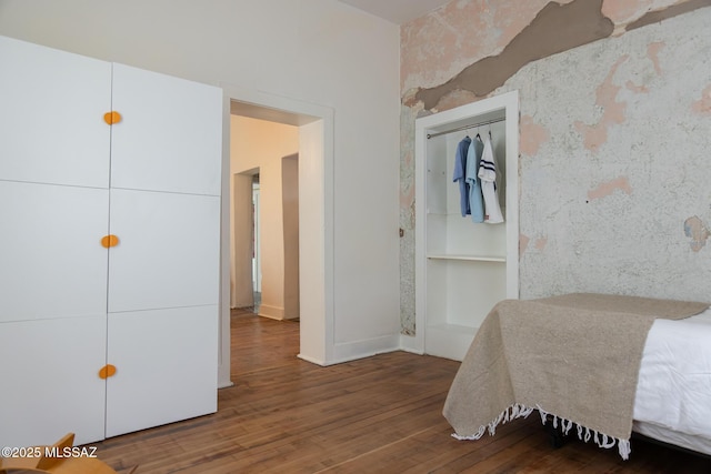 bedroom featuring hardwood / wood-style flooring