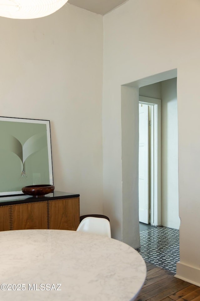 bedroom featuring dark wood-type flooring