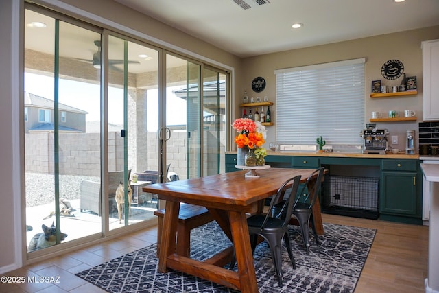 dining area with light hardwood / wood-style flooring