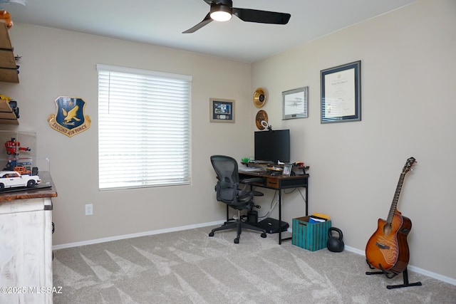 home office with light colored carpet and ceiling fan