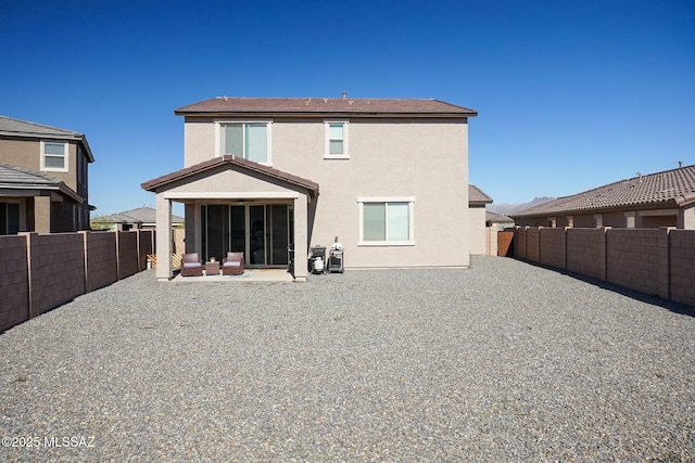 rear view of property with a patio