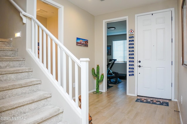 entrance foyer with light hardwood / wood-style floors