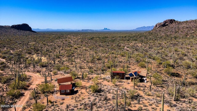 drone / aerial view featuring a mountain view