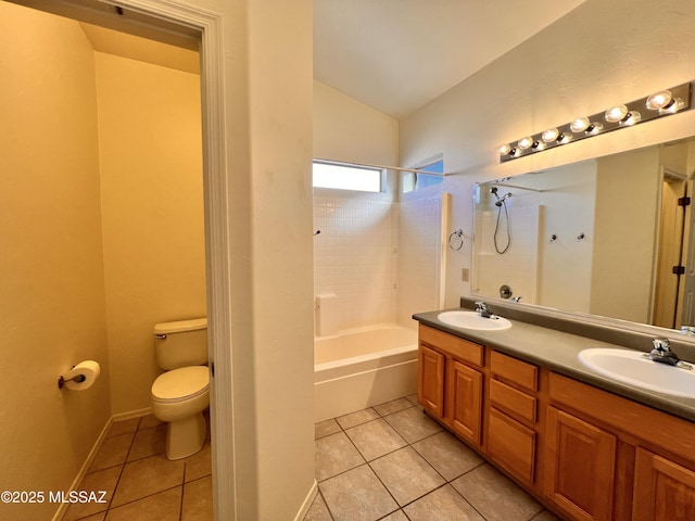 full bathroom with tiled shower / bath combo, lofted ceiling, tile patterned floors, and toilet