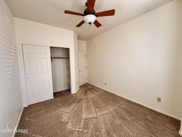 unfurnished bedroom with a closet, ceiling fan, and carpet