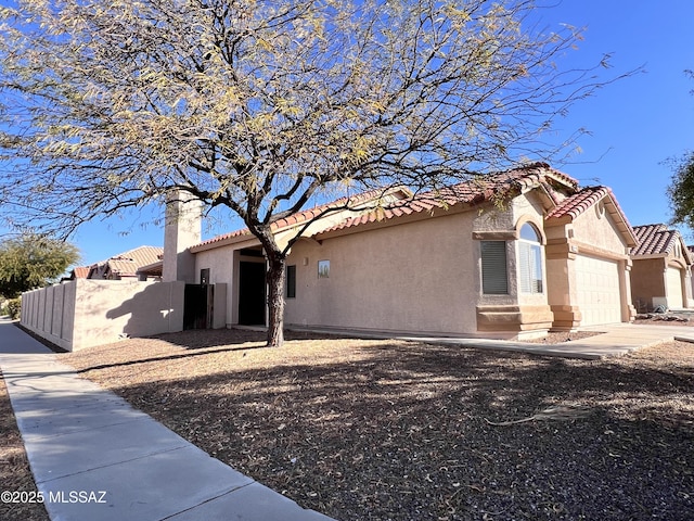 view of front of home with a garage