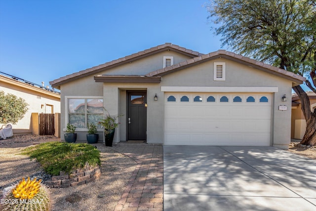 view of front of house with a garage