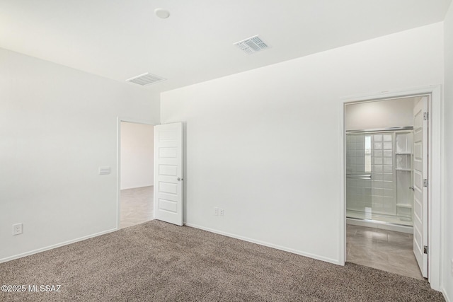 unfurnished bedroom featuring carpet flooring