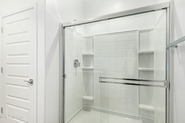 bathroom featuring walk in shower