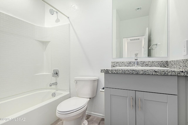 full bathroom with vanity, shower / tub combination, and toilet