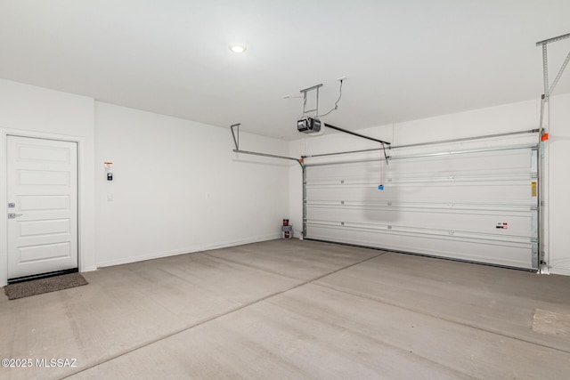 garage featuring a garage door opener