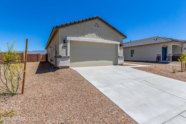 view of property exterior featuring a garage