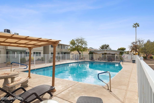 view of pool featuring a patio area and a pergola