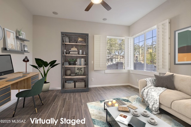 office area with dark wood-type flooring and ceiling fan