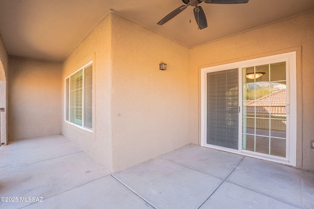 view of patio with ceiling fan