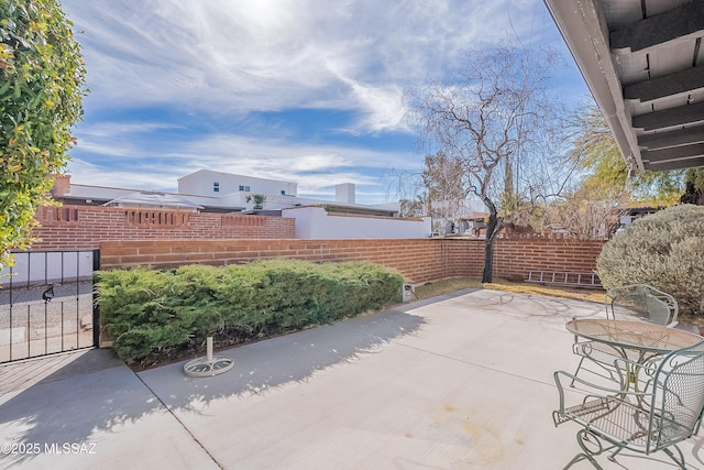 view of patio / terrace with fence