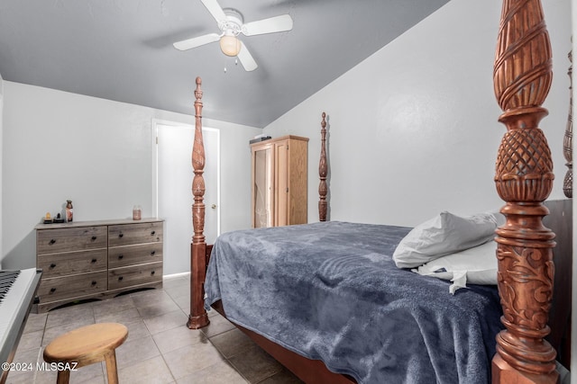 tiled bedroom with ceiling fan