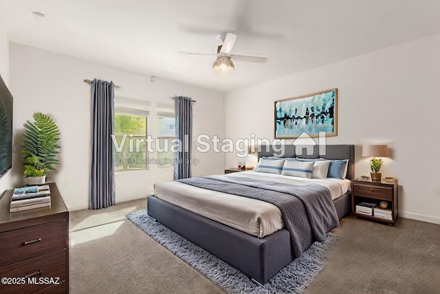 carpeted bedroom with ceiling fan and access to exterior