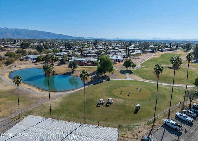 bird's eye view featuring a water and mountain view