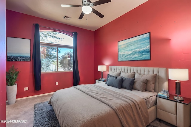 bedroom featuring light carpet and ceiling fan