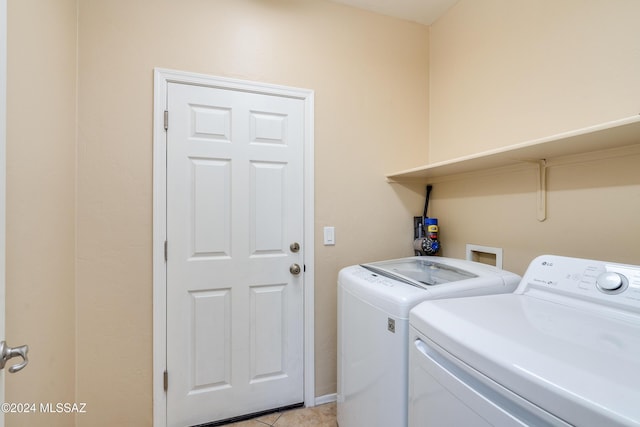 washroom with washer and dryer