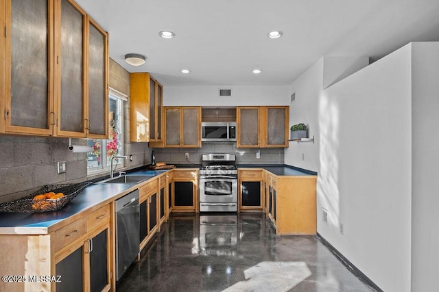 1125 N 13th Ave, Tucson, AZ 85705 - kitchen featuring backsplash, appliances with stainless steel finishes, a sink, and recessed lighting